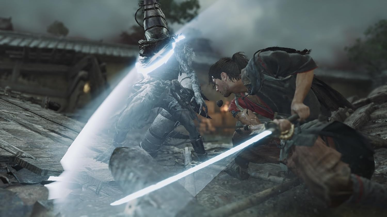 A dramatic action scene showing two armored figures in combat with glowing blue swords in a ruined outdoor setting.