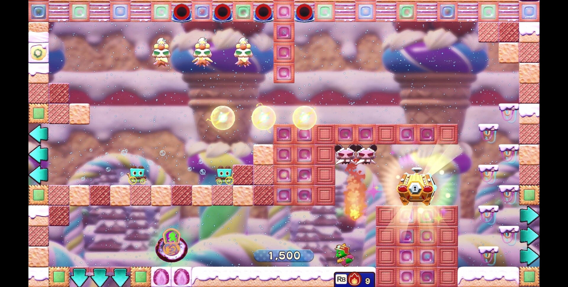 A colorful screenshot from a platformer game showing a whimsical candy-themed level with characters, blocks, and UI elements.