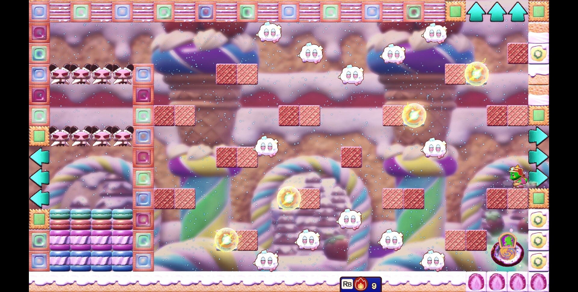 A colorful screenshot from a candy-themed puzzle game, showing a grid with pink candy blocks, rainbow swirls, and small character icons on a pastel background.