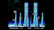 Pixel art video game scene showing a retro sci-fi platformer with tall blue towers, a small character, and on-screen score and shield indicators against a black background.