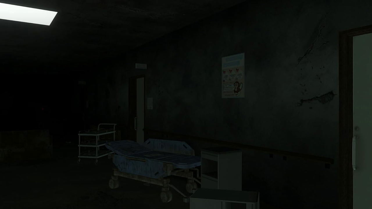 Dark room with a bed and medical equipment