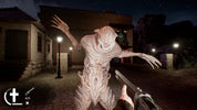 Monster-like creature in a dark, outdoor setting with a gun held by a player.