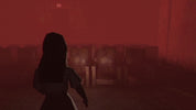 Silhouette of a person in a dark room with a red hue