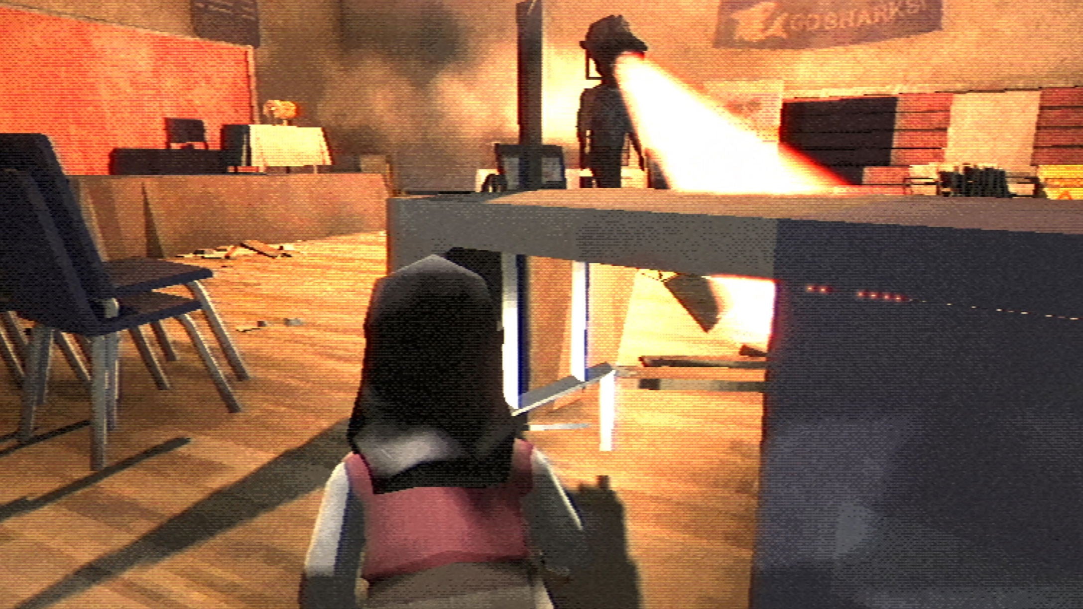 First-person perspective of a player in a virtual environment with a gun and table.