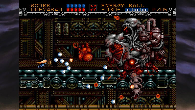 Pixel art screenshot from a retro 2D video game, showing a small blue character facing a large mechanical red and gray boss in a dark industrial level with score and status bars at the top.