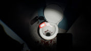 A white ceramic toilet with the lid open, shown in a dark bathroom scene with a flashlight beam illuminating the inside of the bowl and floor. A red-and-white handheld device rests on the rim, with a key on the toilet lid and blood-like splatters on the floor.