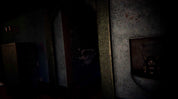 A dark, atmospheric scene showing a dimly lit interior with a doorway, textured walls, and a small framed object on the right wall.