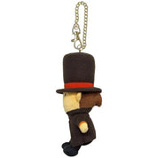A plush character keychain or bag charm shaped like a small figure wearing a tall dark brown top hat with a red band, a dark brown coat, and black shoes, attached to a gold-tone chain and clasp, on a plain white background.