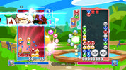 Colorful game interface with character portraits, score display, and game elements on a vibrant background.