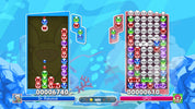 Screenshot of a puzzle game with colorful characters and a blue background