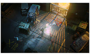 A top-down video game scene showing a character standing on a metal walkway in an industrial alley with vehicles, crates, and bright explosions or light effects.