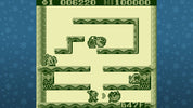 Game screen with a maze-like layout and characters on a blue background with snowflake pattern