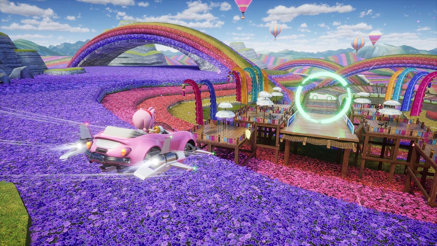 Colorful racing track with cartoon cars on a bright day