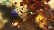 Space battle scene with spacecraft and debris in a video game setting
