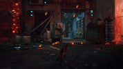Dark, industrial interior with a character standing in the foreground