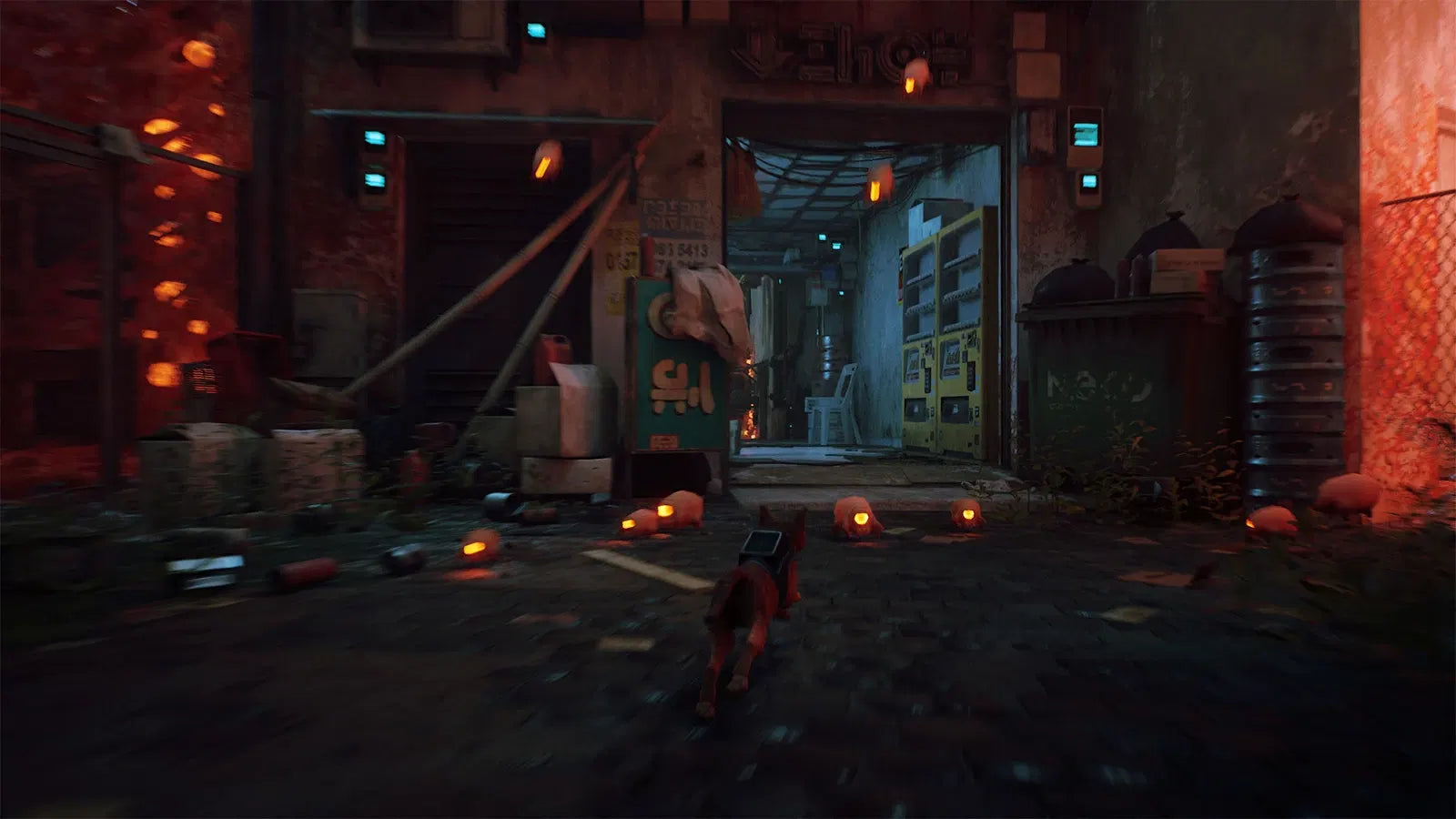 Dark, industrial interior with a character standing in the foreground
