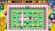 Screenshot of a colorful platformer game with characters and power-ups on a checkered background.
