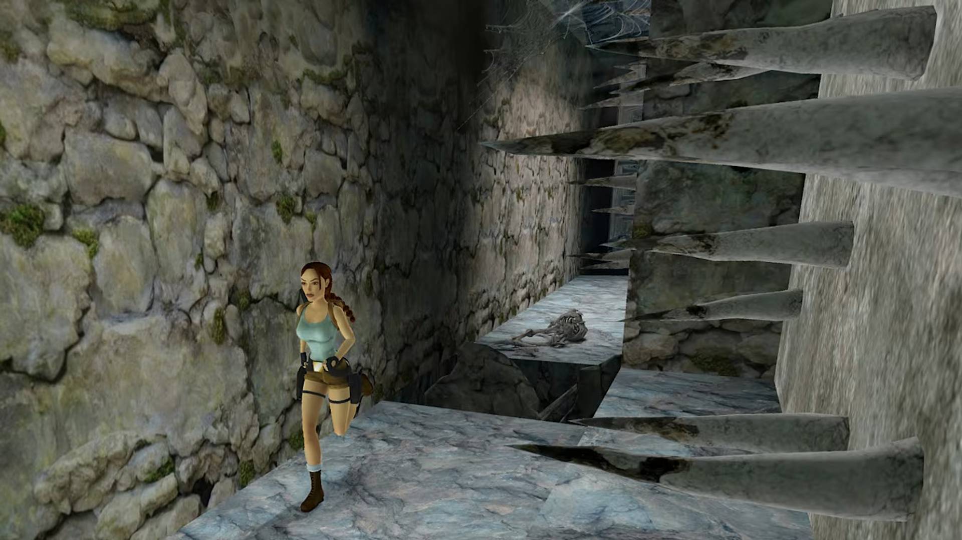 Character in a video game setting with stone walls and steps
