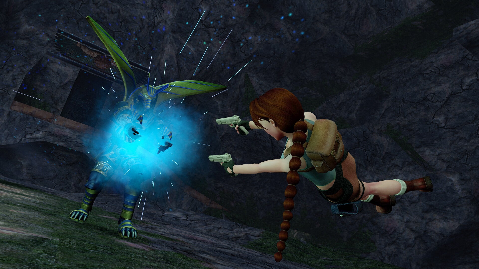Character interacting with a glowing blue creature in a dark, cave-like setting
