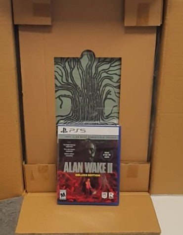 PS5 game case for 'Alan Wake II' on a cardboard surface