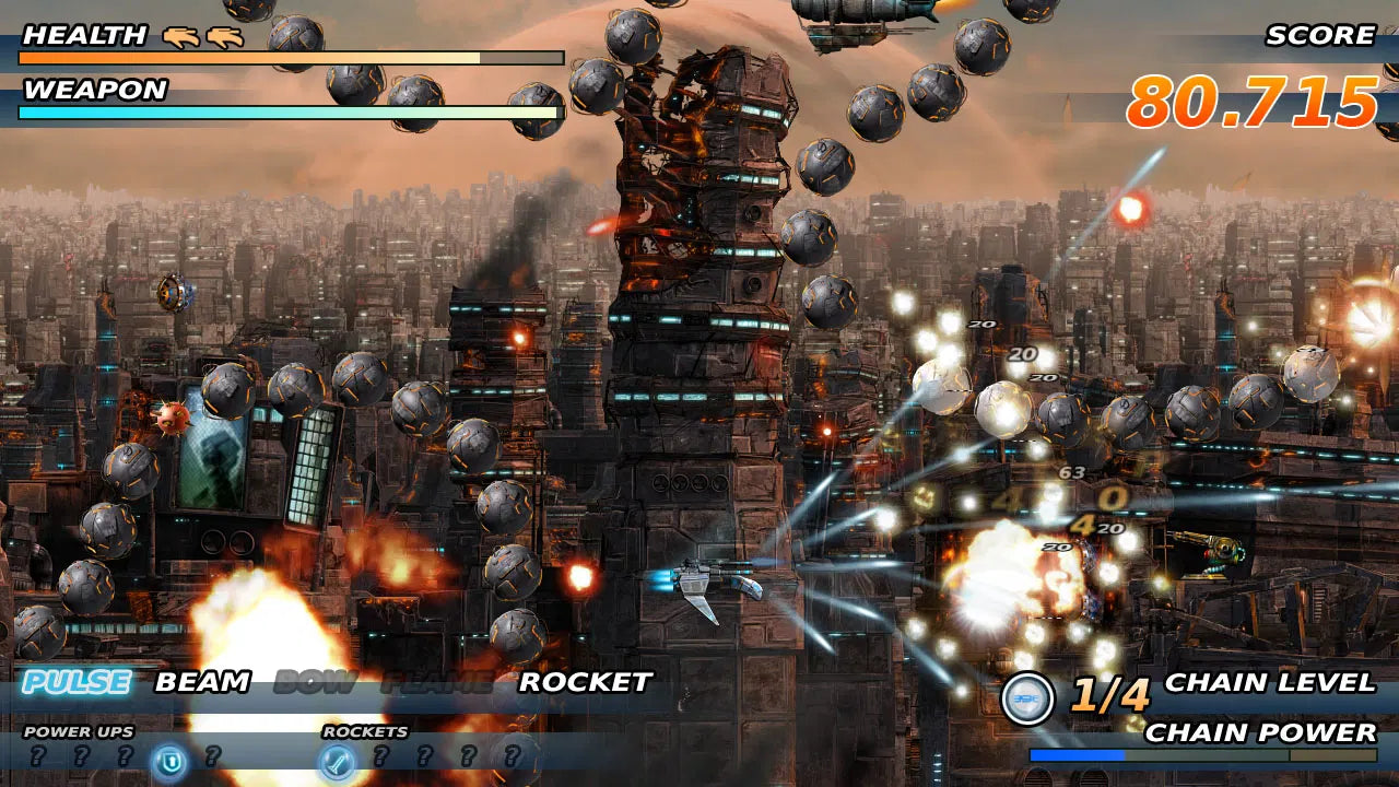 Video game screen showing a battle scene with a large tower and explosions in an urban setting.